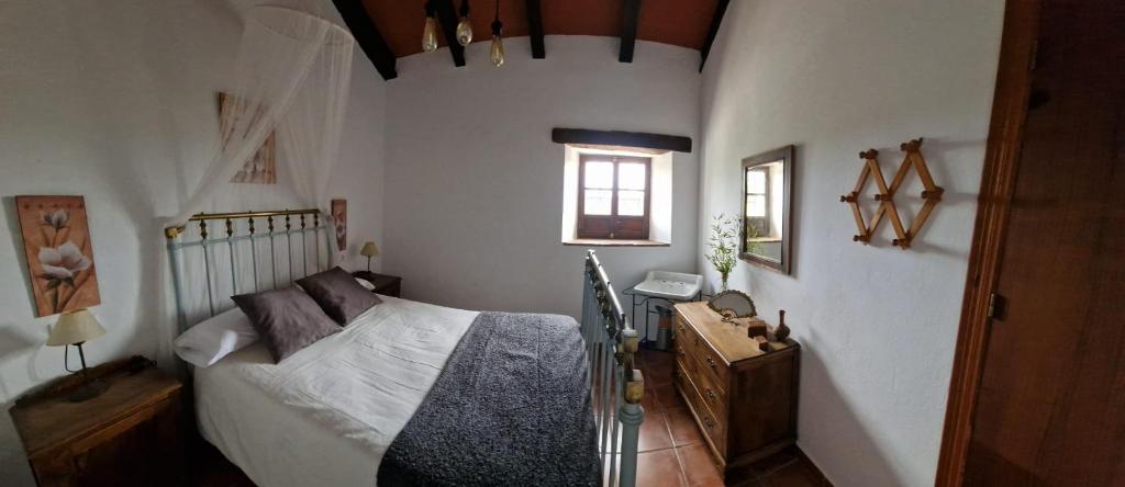 Postel nebo postele na pokoji v ubytování Villa Botero