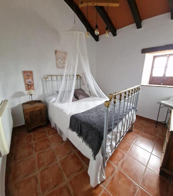 Postel nebo postele na pokoji v ubytování Villa Botero