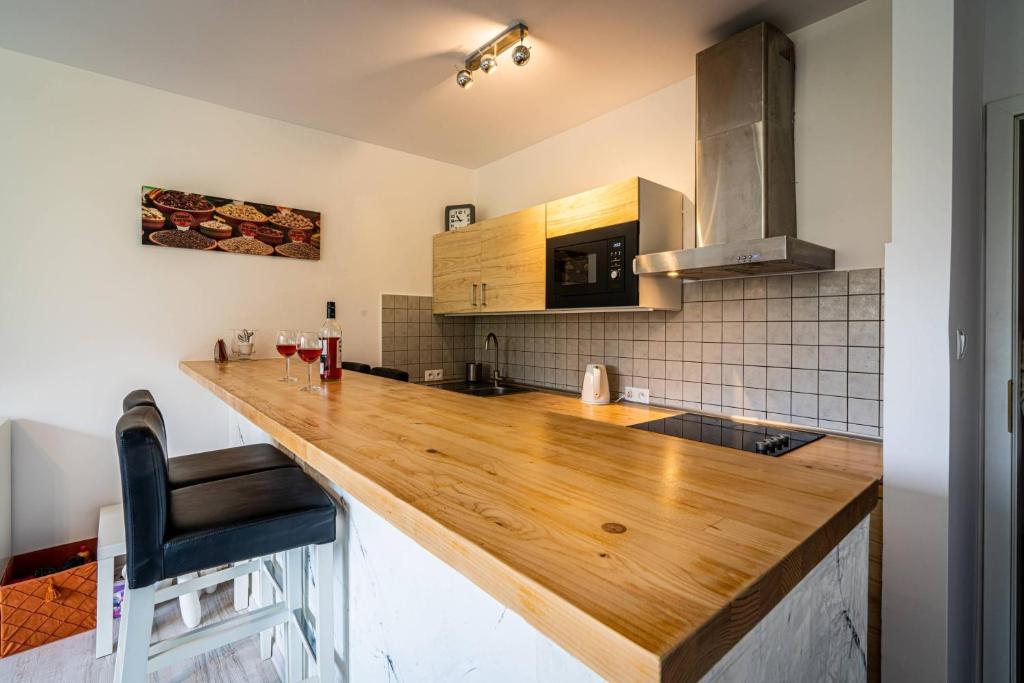 Kuchyňa alebo kuchynka v ubytovaní Apartament Ustronny