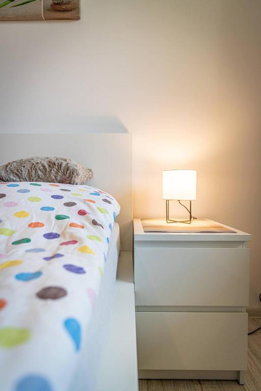 Posteľ alebo postele v izbe v ubytovaní Apartament Ustronny