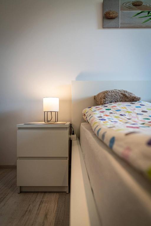 Posteľ alebo postele v izbe v ubytovaní Apartament Ustronny