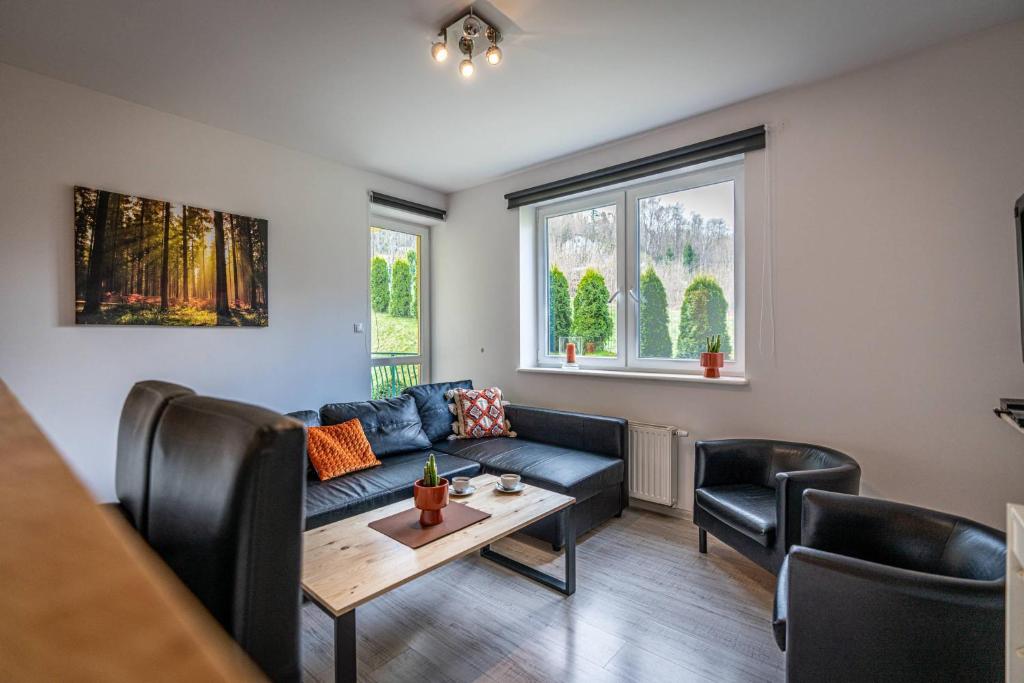 Posedenie v ubytovaní Apartament Ustronny