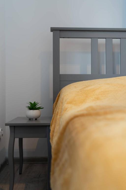 Posteľ alebo postele v izbe v ubytovaní Apartamenty Ustronne Liściasta