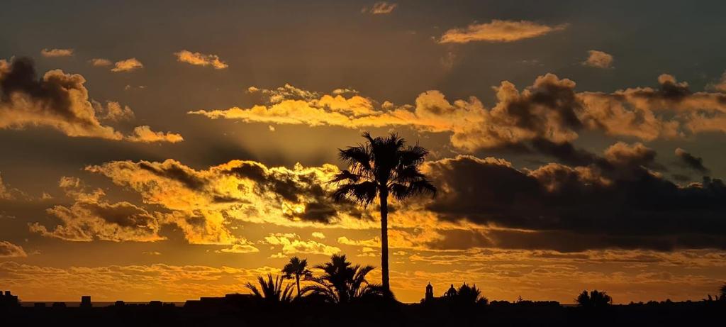 Východ nebo západ slunce při pohledu z apartmánu nebo okolí