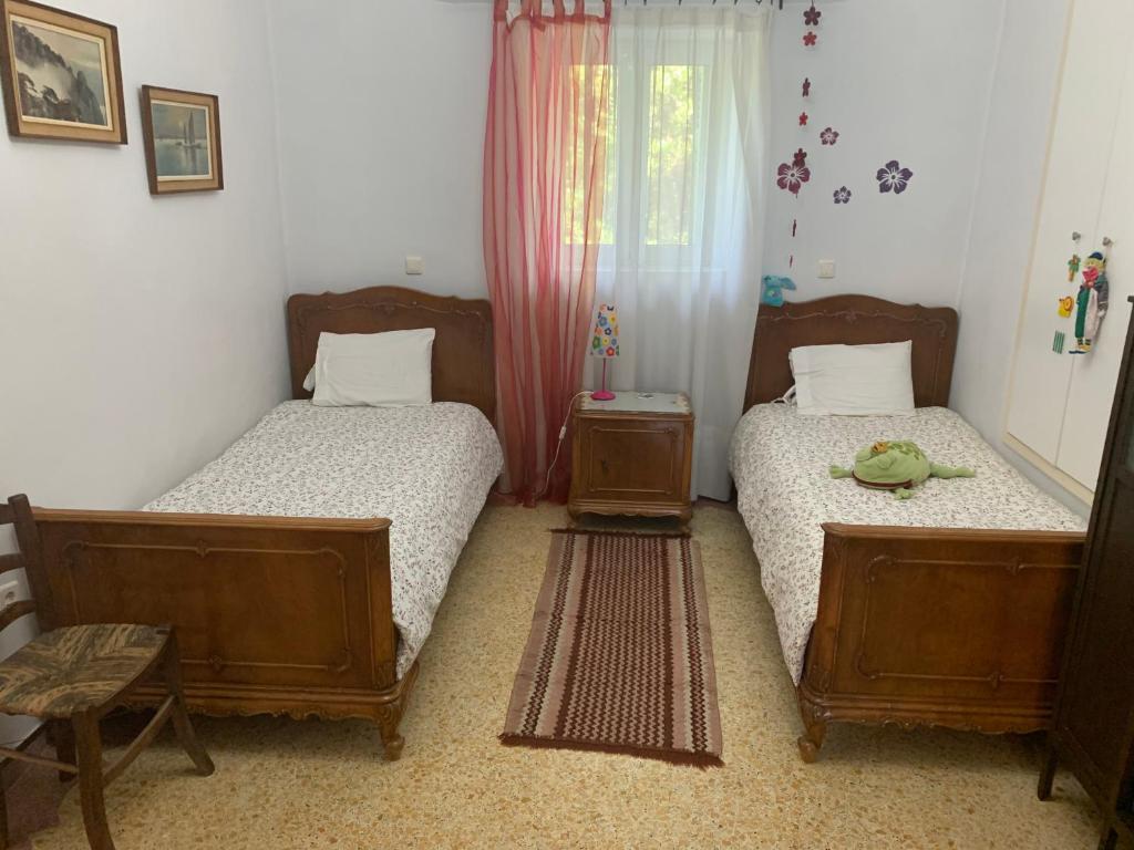 Ліжко або ліжка в номері House in Xanemo