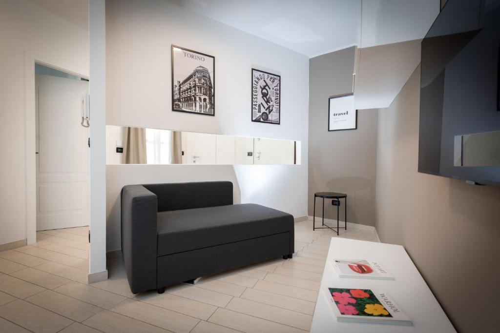Łóżko lub łóżka w pokoju w obiekcie TURINHOMETOWN Residence Apartments