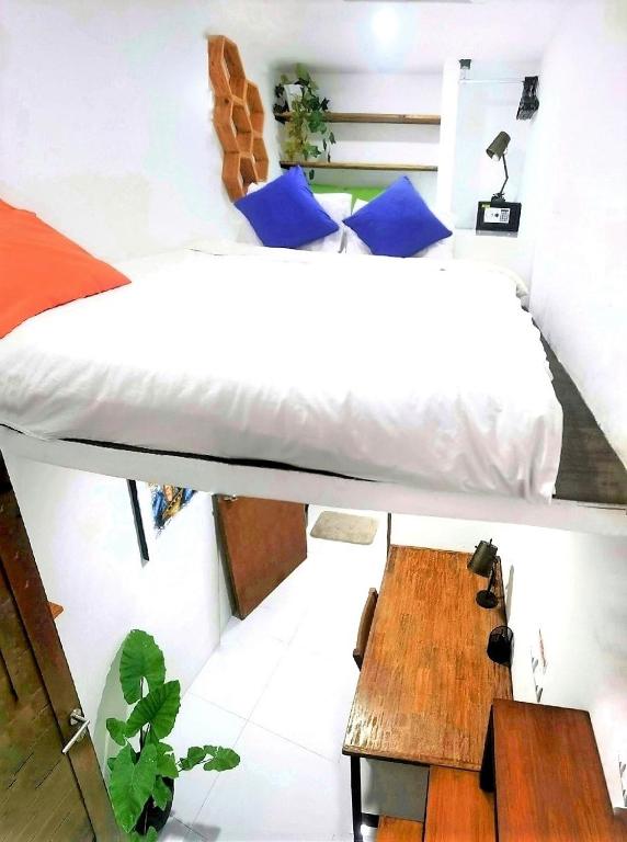 Postel nebo postele na pokoji v ubytování Cornerstone Bali Coworking