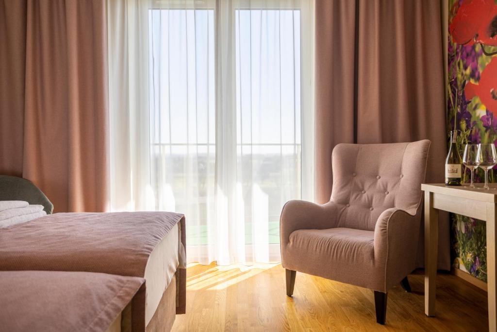 Posteľ alebo postele v izbe v ubytovaní Terma Słowacki Resort Medical Spa