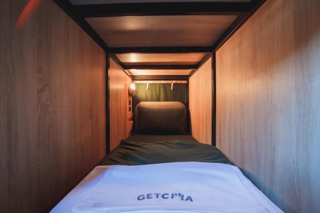 Postel nebo postele na pokoji v ubytování Getcha Hostel