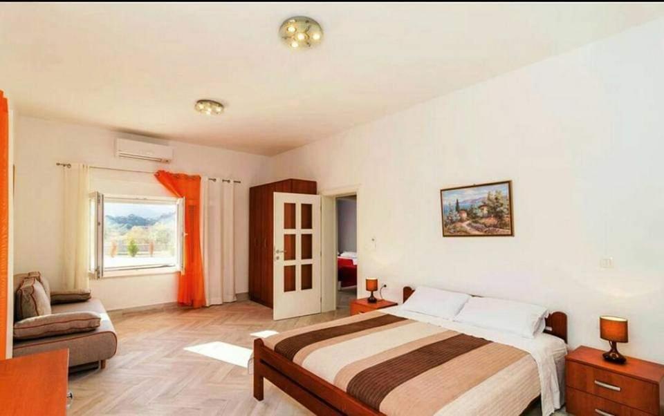 Postel nebo postele na pokoji v ubytování Villa Fabry