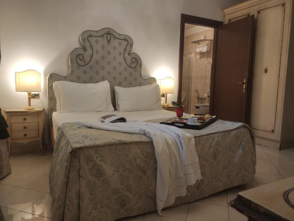 A bed or beds in a room at Ca' Vendramin Zago