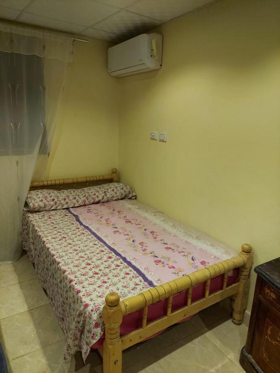 Postel nebo postele na pokoji v ubytování Toman Pyramids hotel