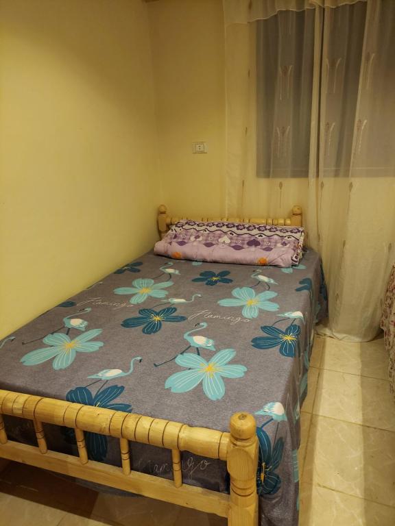 Postel nebo postele na pokoji v ubytování Toman Pyramids hotel