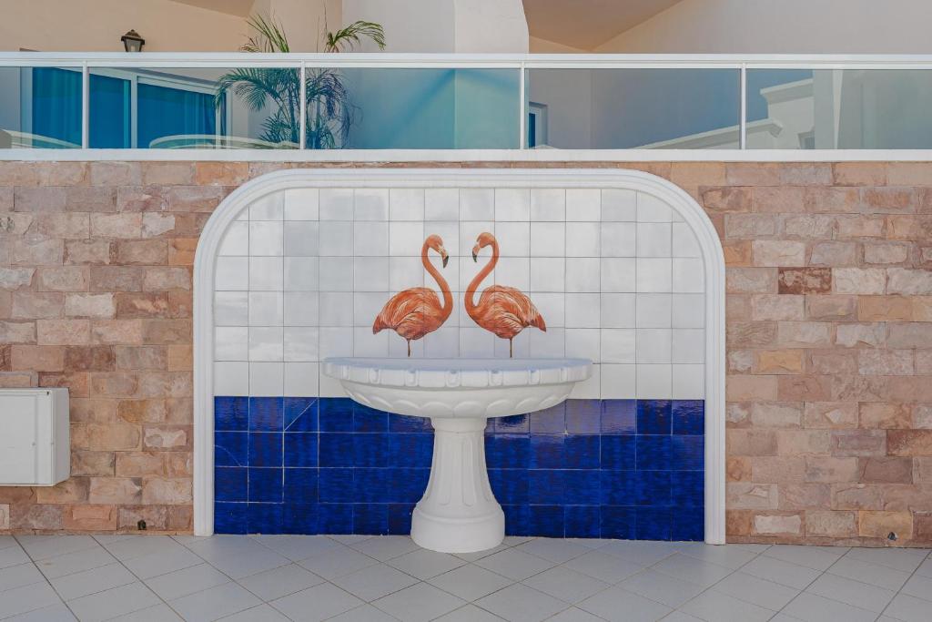 Koupelna v ubytování Flamingo Suites Boutique Hotel