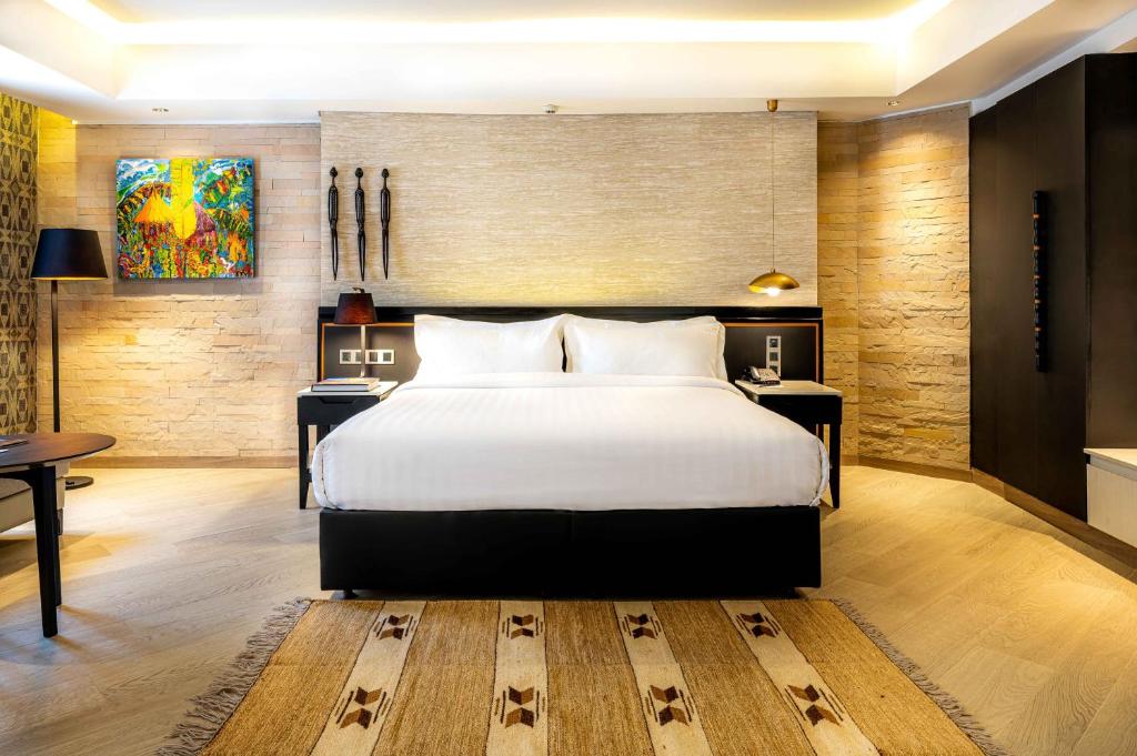 Postel nebo postele na pokoji v ubytování Tribe Hotel, Nairobi, a Member of Design Hotels