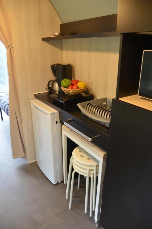 Cuisine ou kitchenette dans l&#39;&eacute;tablissement Camping Les Mijeannes