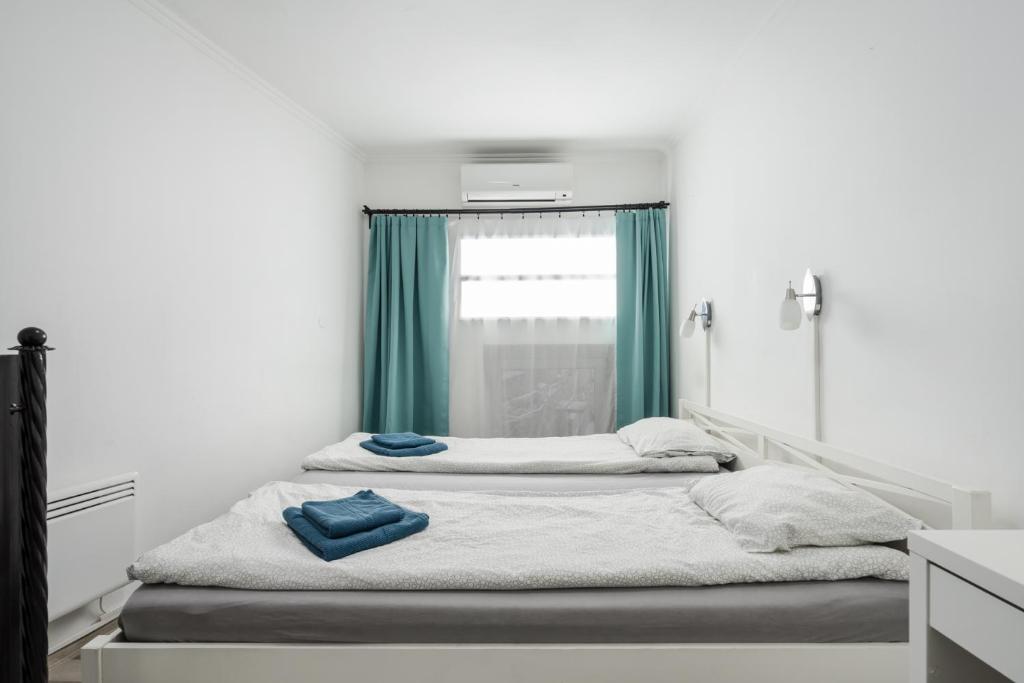 Posteľ alebo postele v izbe v ubytovaní BpR Simply Azure Apartment