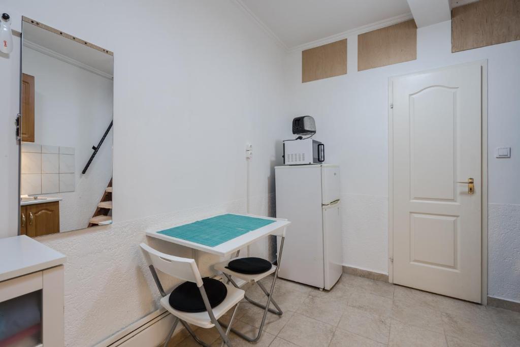 Kuchyňa alebo kuchynka v ubytovaní BpR Simply Azure Apartment