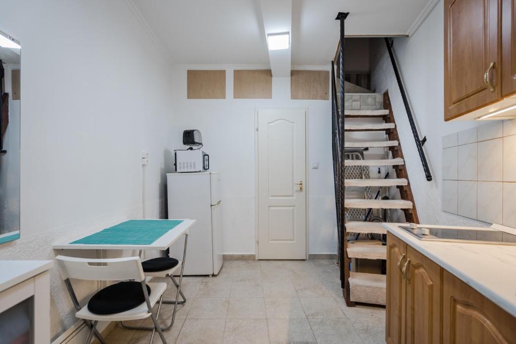 Kuchyňa alebo kuchynka v ubytovaní BpR Simply Azure Apartment