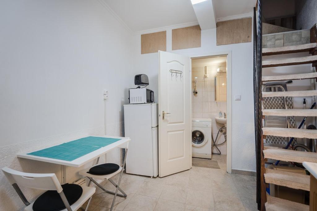 Kuchyňa alebo kuchynka v ubytovaní BpR Simply Azure Apartment