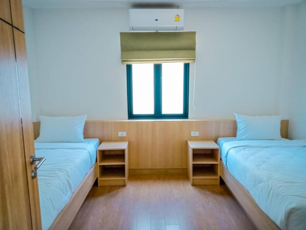 Postel nebo postele na pokoji v ubytování HATCHAO HERITAGE BEACH FRONT RESORT