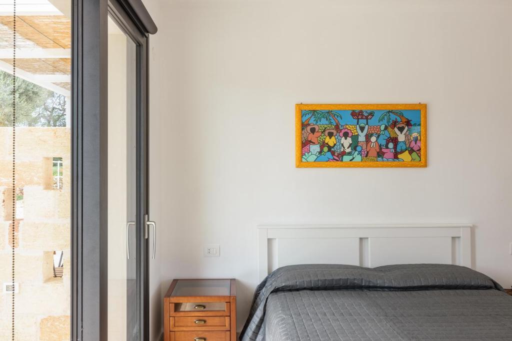 Posteľ alebo postele v izbe v ubytovaní CASA MARGOT