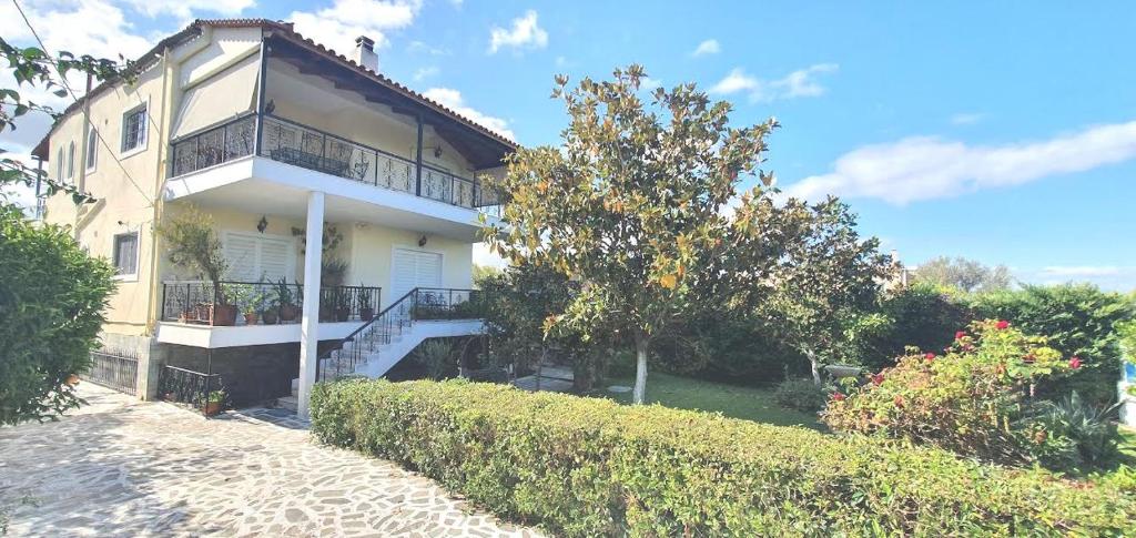 Vacation and Relaxation Home Oropos - Casa De Dos Dormitorios