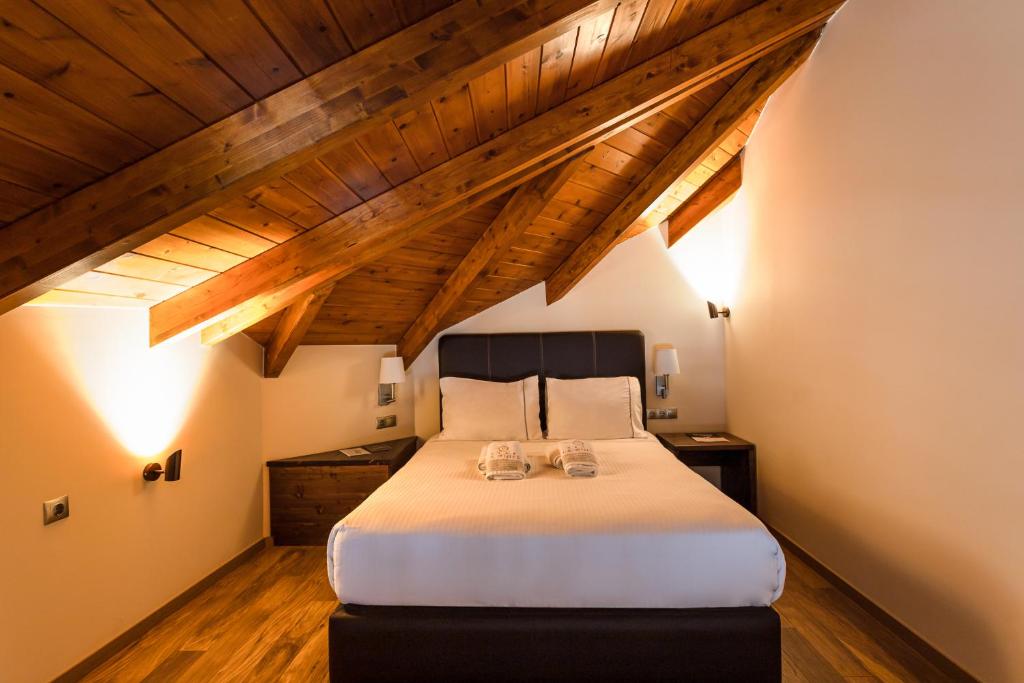 Posteľ alebo postele v izbe v ubytovaní La Suite Boutique Hotel & Spa