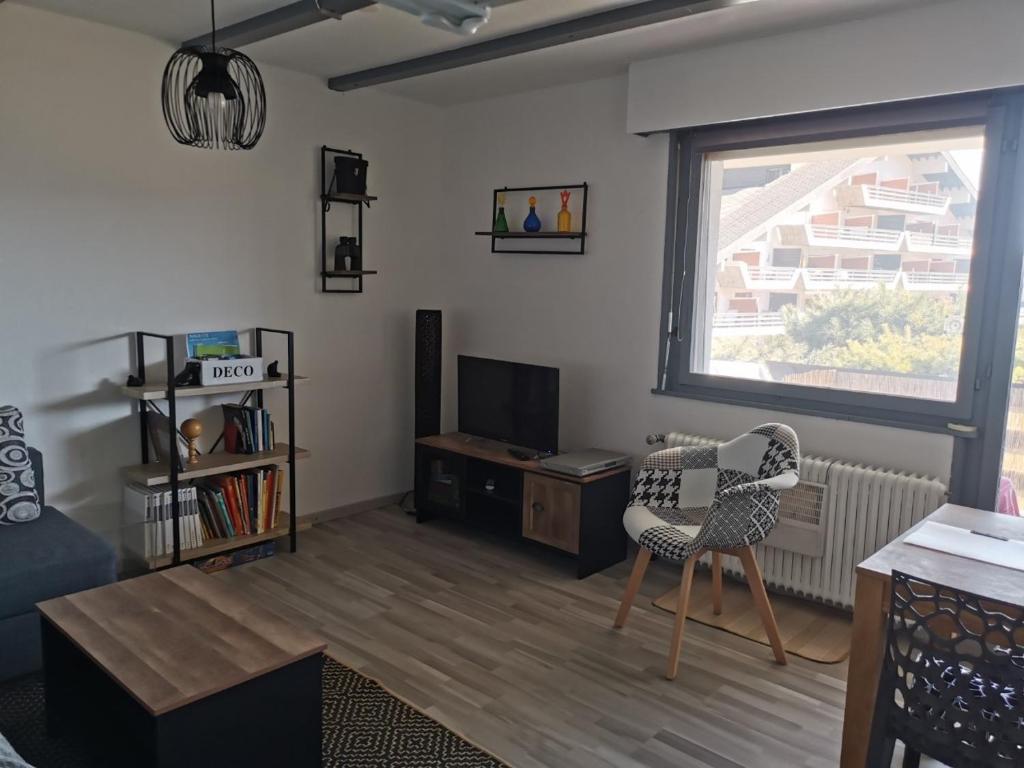 TV a/nebo společenská místnost v ubytování Appartement Torgon