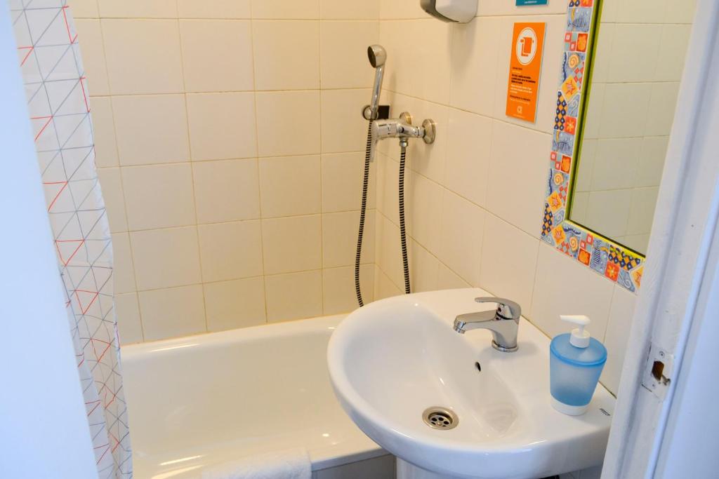 Kúpeľňa v ubytovaní Alda Centro León