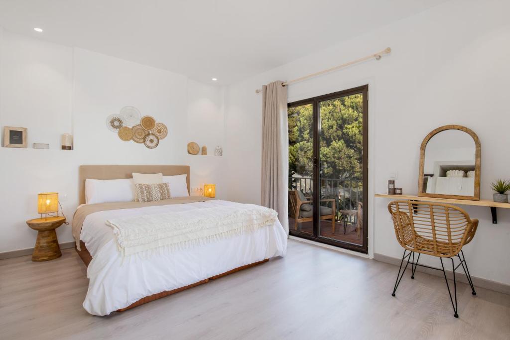 Łóżko lub łóżka w pokoju w obiekcie Luminoso apartamento en Andalucía del Mar