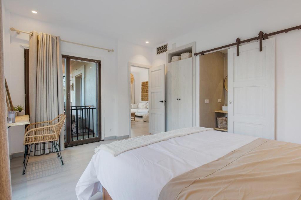 Łóżko lub łóżka w pokoju w obiekcie Luminoso apartamento en Andalucía del Mar