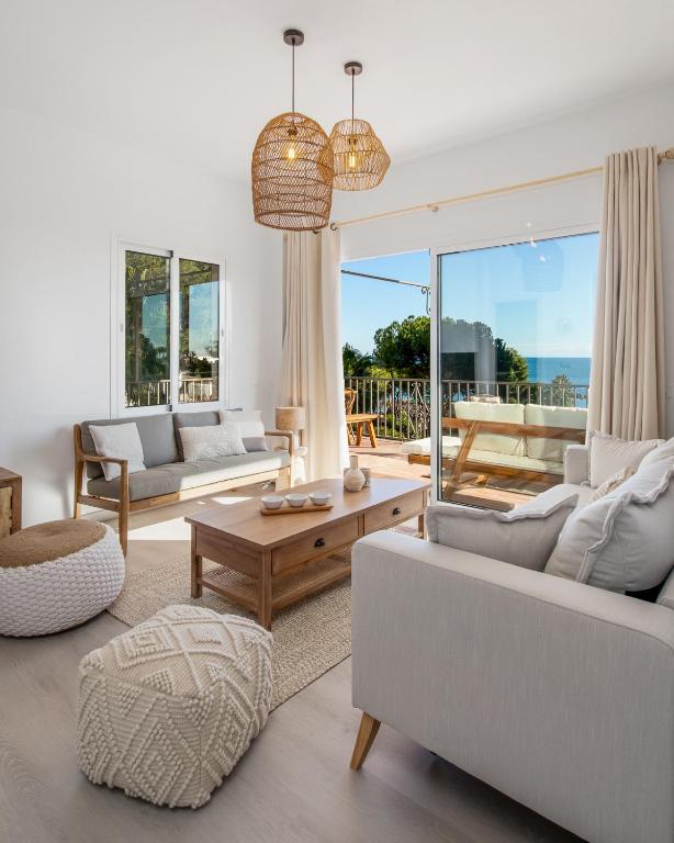 Część wypoczynkowa w obiekcie Luminoso apartamento en Andalucía del Mar