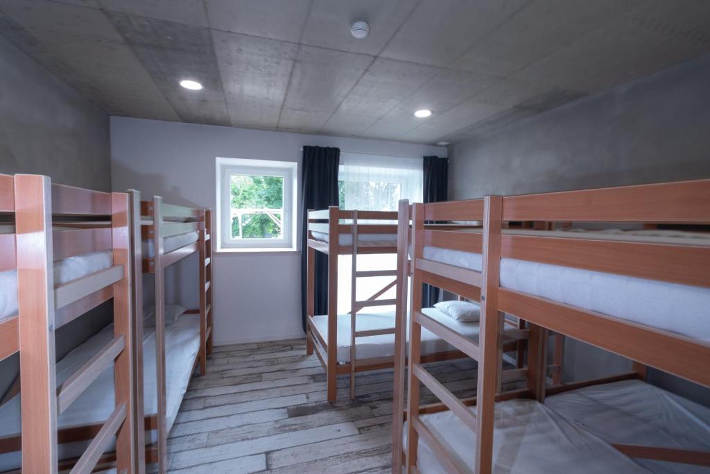 Postel nebo postele na pokoji v ubytování La Ferme des Arêtes