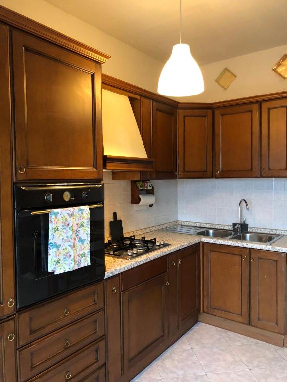 A kitchen or kitchenette at Appartamento “BellaVista” a Norma