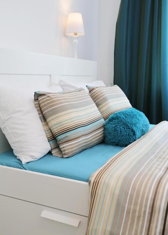 Postel nebo postele na pokoji v ubytování Boutique Hotel Alegria