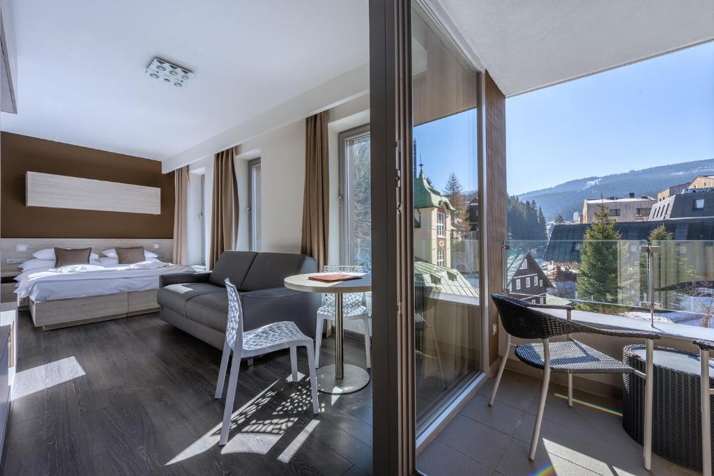 Postel nebo postele na pokoji v ubytování HOTEL PECR WELL