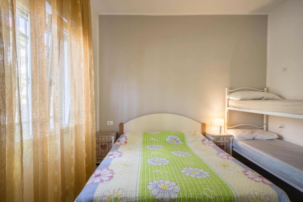 Posteľ alebo postele v izbe v ubytovaní Residenza Maja 2