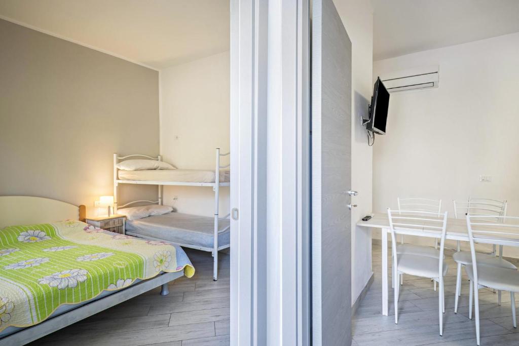 Posteľ alebo postele v izbe v ubytovaní Residenza Maja 2