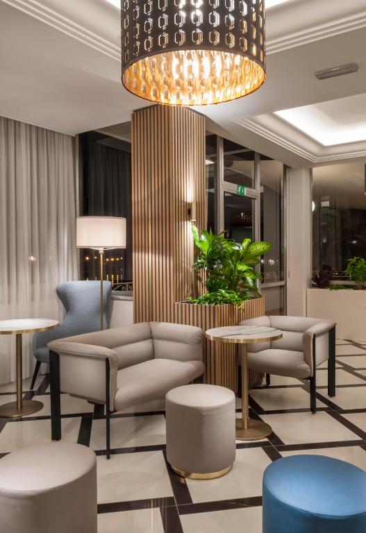 Posezení v ubytování Hotel Alexander