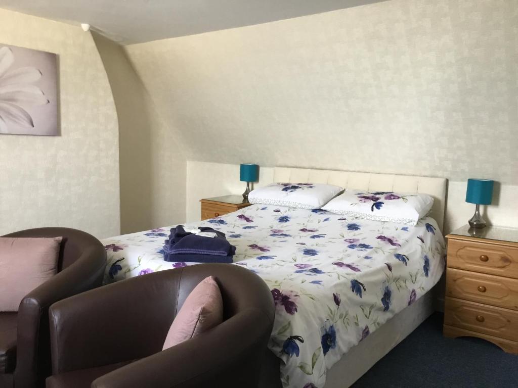 Кровать или кровати в номере Cavendish House