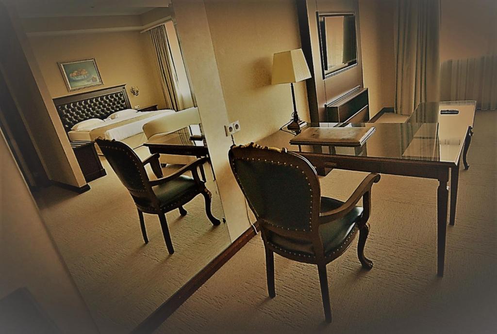 Postel nebo postele na pokoji v ubytování Hotel Monec