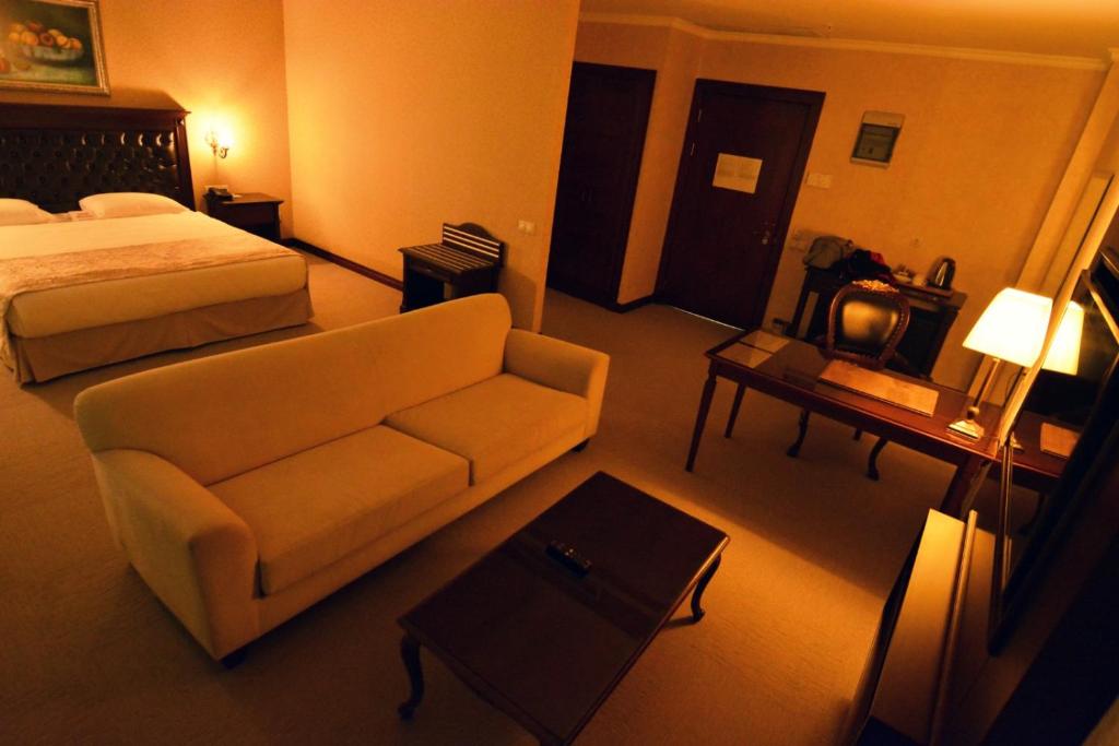 Postel nebo postele na pokoji v ubytování Hotel Monec