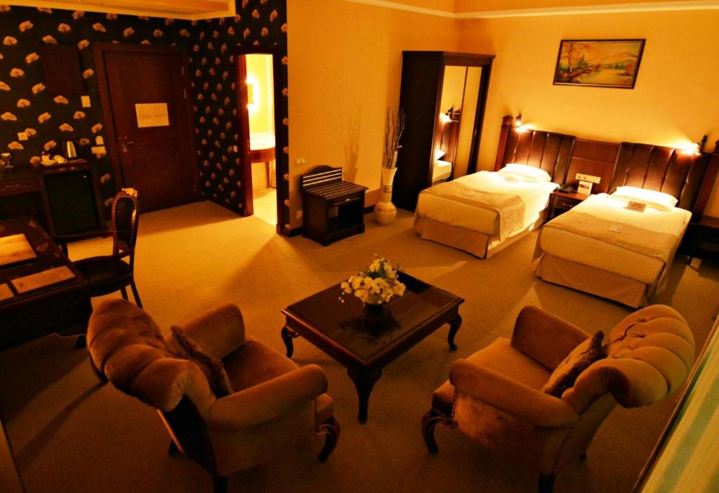 Postel nebo postele na pokoji v ubytování Hotel Monec