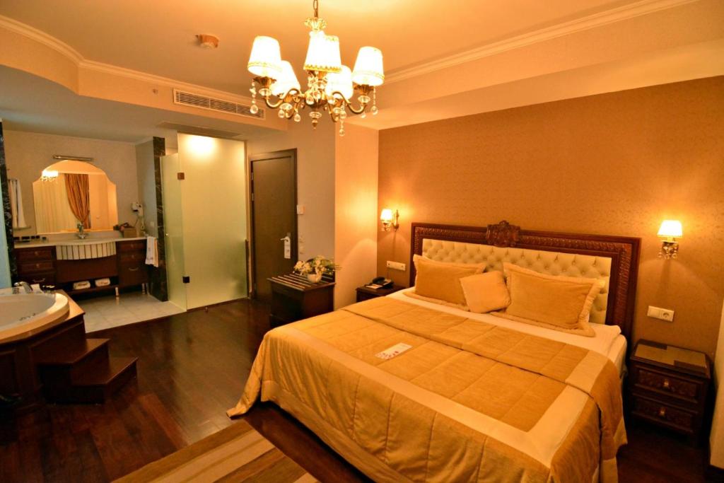 Postel nebo postele na pokoji v ubytování Hotel Monec