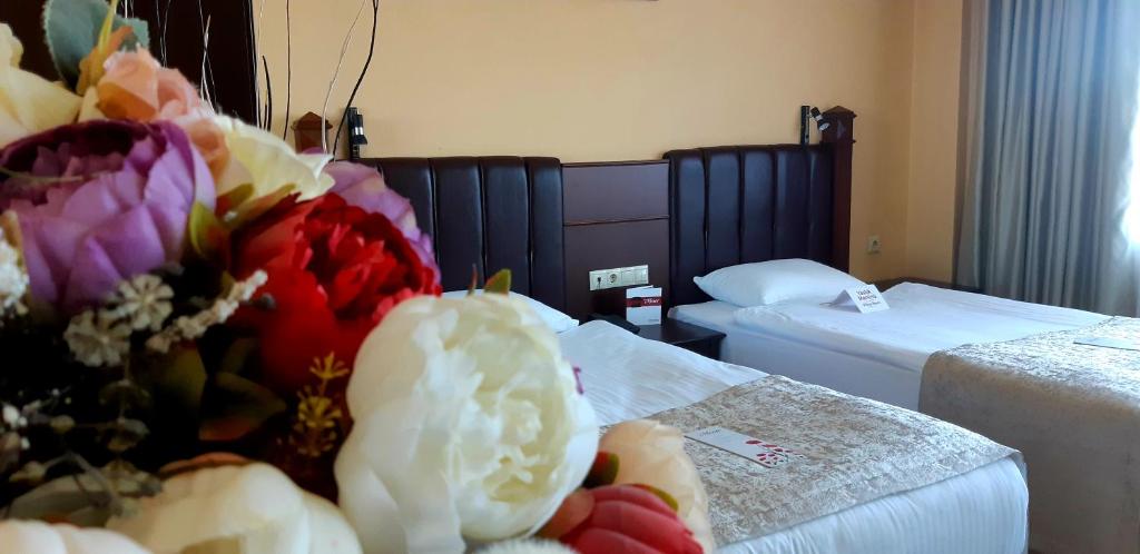 Postel nebo postele na pokoji v ubytování Hotel Monec