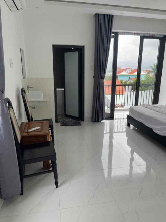 Postel nebo postele na pokoji v ubytování Moon house villa