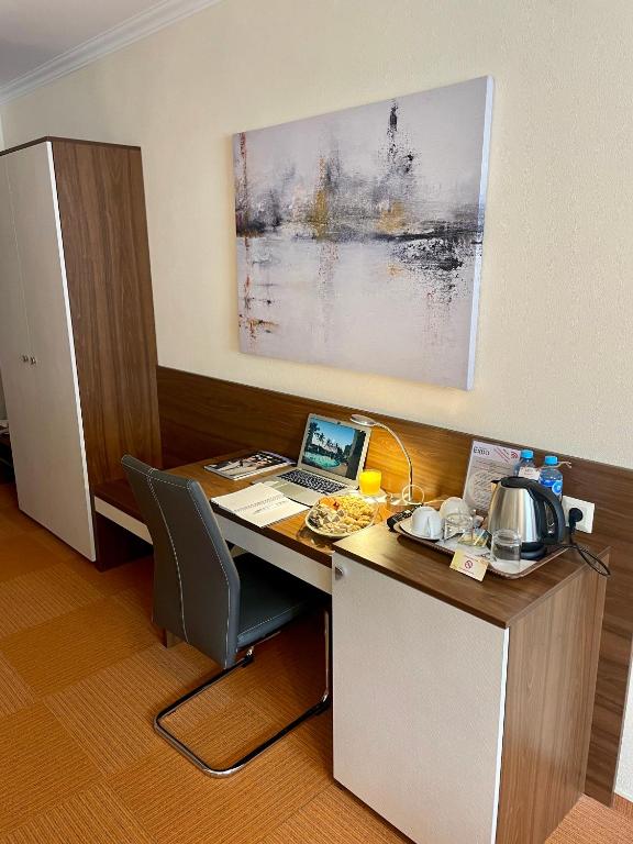 Kuchyň nebo kuchyňský kout v ubytování Hotel Garni Expo
