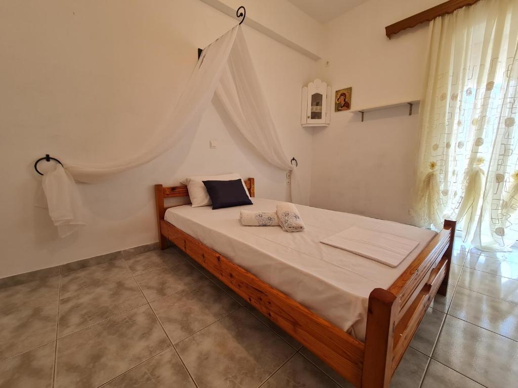 Postel nebo postele na pokoji v ubytování Myrtia Guest House