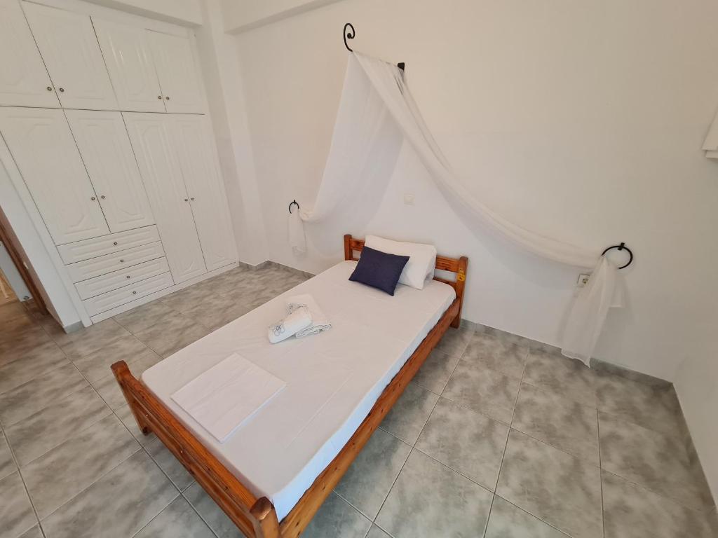 Postel nebo postele na pokoji v ubytování Myrtia Guest House